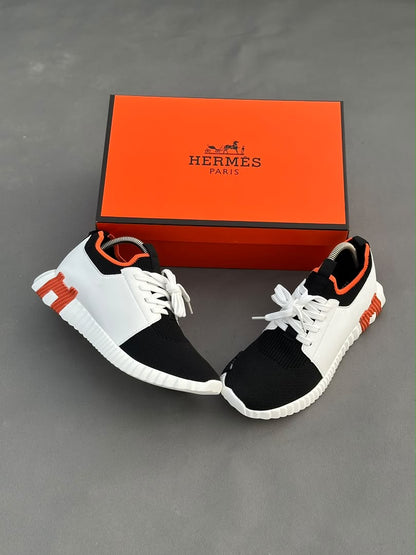 Baskets Hermès à enfiler Depart Blanc Noir Semelle Blanche