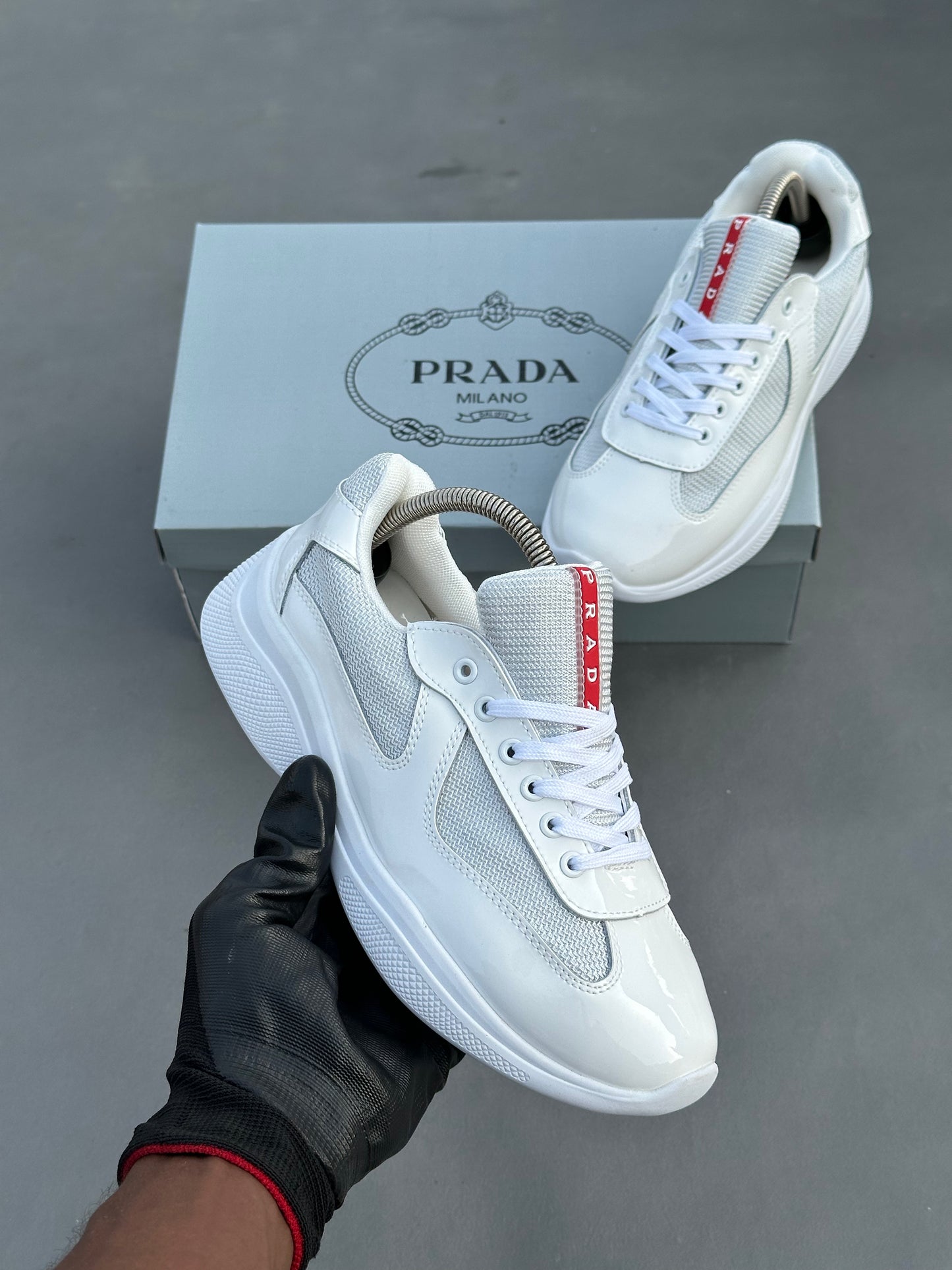Baskets Prada America's Cup en cuir verni et tissu technique Blanc