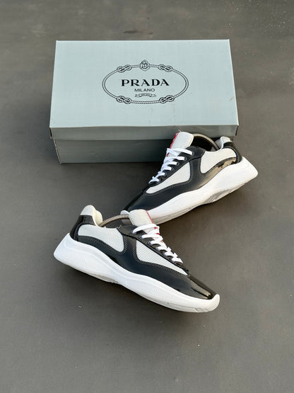 Baskets Prada America's Cup en cuir verni et tissu technique Noir-Blanc