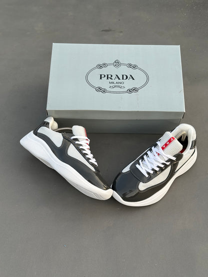 Baskets Prada America's Cup en cuir verni et tissu technique Noir-Blanc