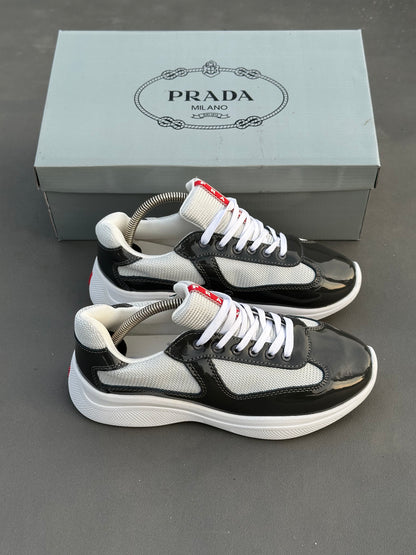 Baskets Prada America's Cup en cuir verni et tissu technique Noir-Blanc