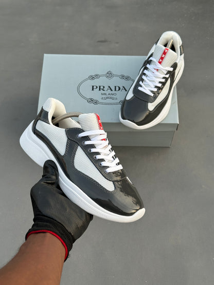 Baskets Prada America's Cup en cuir verni et tissu technique Noir-Blanc