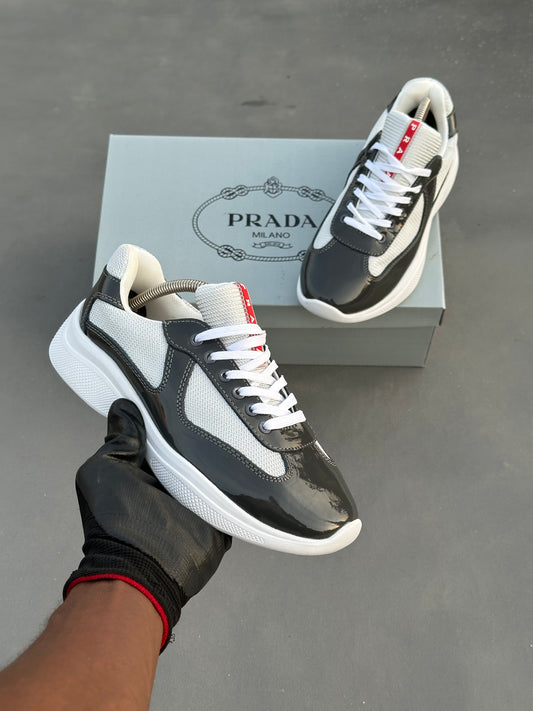 Baskets Prada America's Cup en cuir verni et tissu technique Noir-Blanc